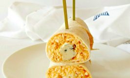 Creamy Buffalo chicken dip is spread onto tortillas and sprinkled with blue cheese in these Red Hot Chicken and Blue Cheese Bites. #SundaySupper