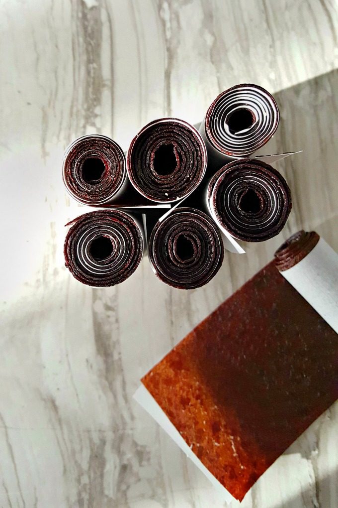 Simple fruit puree is slowly baked in the oven to make these kids fave snacks. Fruit Leather can be made with almost any fruit and takes very little effort to make a tasty, packable, snack for big and little kids.