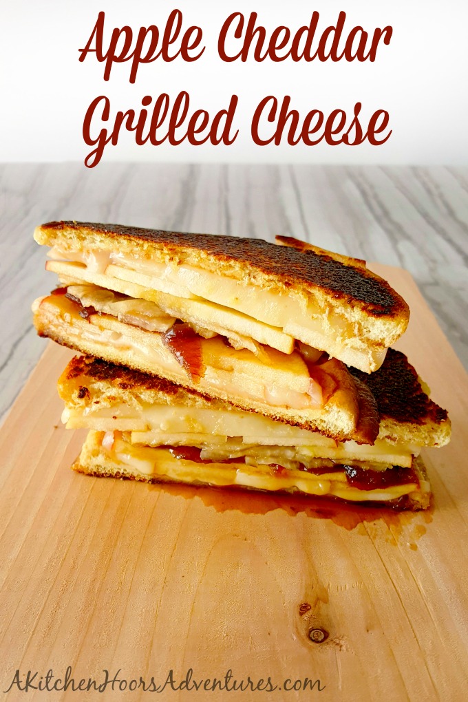Apple Cheddar Grilled Cheese is fall in a grilled cheese. It has crisp and crunchy apples, sharp and creamy cheddar, and sweet and delicious caramelized onions. #AppleWeek