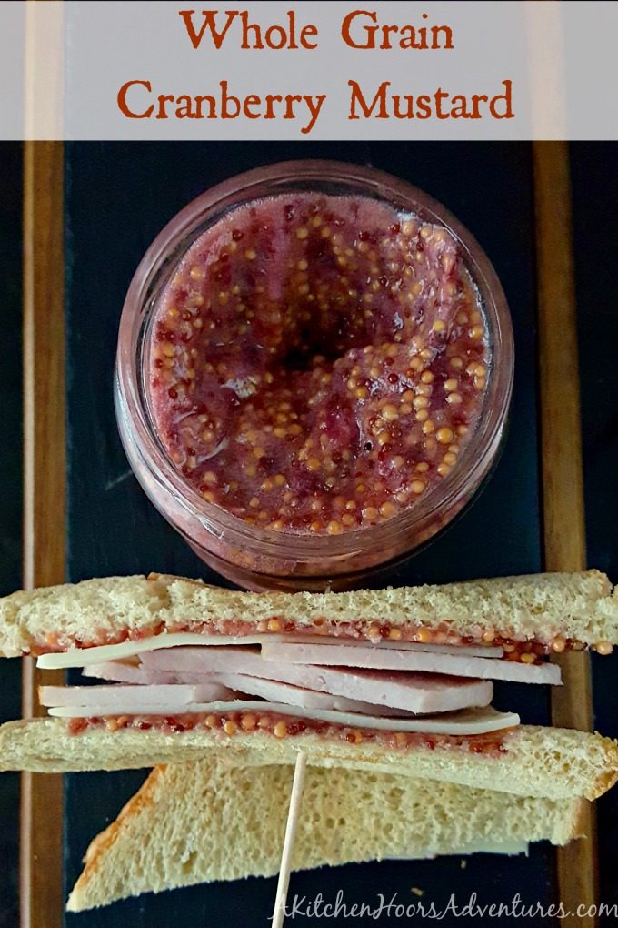 This Whole Grain Cranberry Mustard is simple to make, uses up leftover cranberry sauce, and tastes amazing on your leftover turkey sandwiches. Or any sandwich for that matter! #CranberryWeek