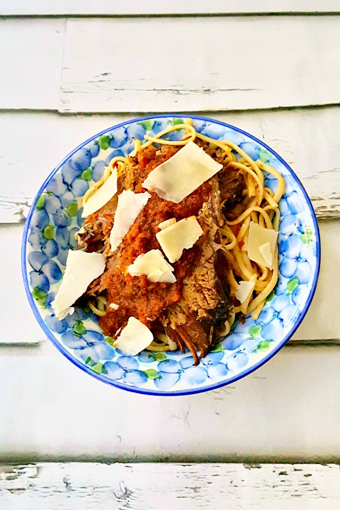 Gifted red wine becomes the base for this tender and rich Slow Cooker Red Wine Braised Roast Beef. The tomatoes cooked with the beef make the perfect "gravy" for your pasta.