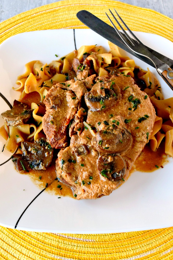 It can't get simpler than throwing all the ingredients in the slow cooker and letting it do the work for you. Slow Cooker Pork Chops with Mushroom Sauce are not only super easy but SUPER delicious, too! Your family will ask for these all the time.