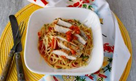Grating the tomatoes tastes like summer in a sauce. Grilled Chicken and Pasta with Grated Tomato Sauce has a fresh tasting sauce with succulent and delicious grilled chicken.