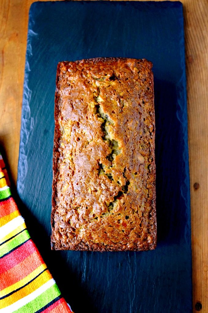 Bourbon Banana Bread with Pistachios has hints of bourbon through with the crunch of pistachio and sweet bananas. Bake and take because it's too dangerous to keep at home! #FreakyFriday