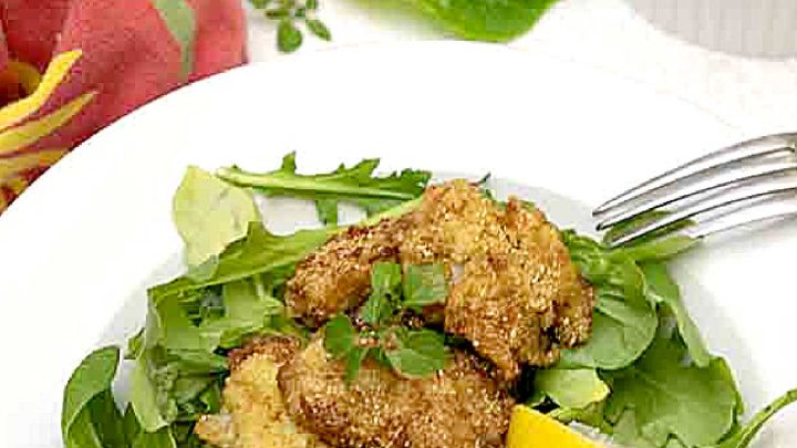 Spicy and crunchy with a taste of the Gulf, New Orleans Fried Oyster Salad is an easy and delightful way to armchair travel!