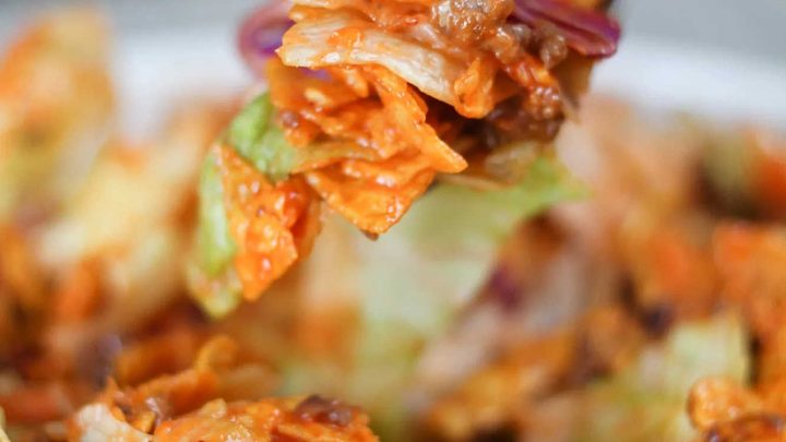 Combine bagged salad, crushed Doritos Nacho Cheese, and Catalina dressing with ground beef for an amazing Beefy Doritos Taco Salad.