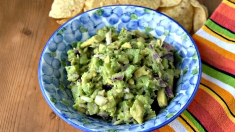 The sweet kiwi and the creamy avocado pair well with the jalapeno in this delicious guacamole. Kiwi Guacamole is addictively delicious and perfect for summer nibbles.