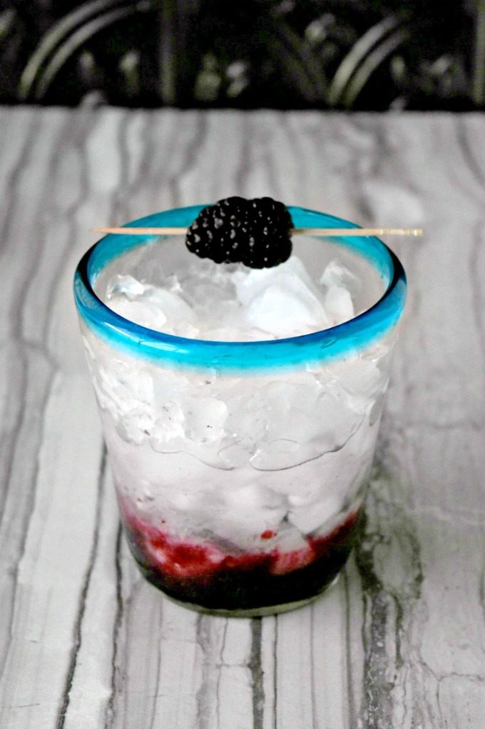Blackberry simple syrup is the basis for this deliciously simple mixed drink.  They're rich enough to complement the flavor of the gin and ginger in this Blackberry Gin Mule. #SundaySupper