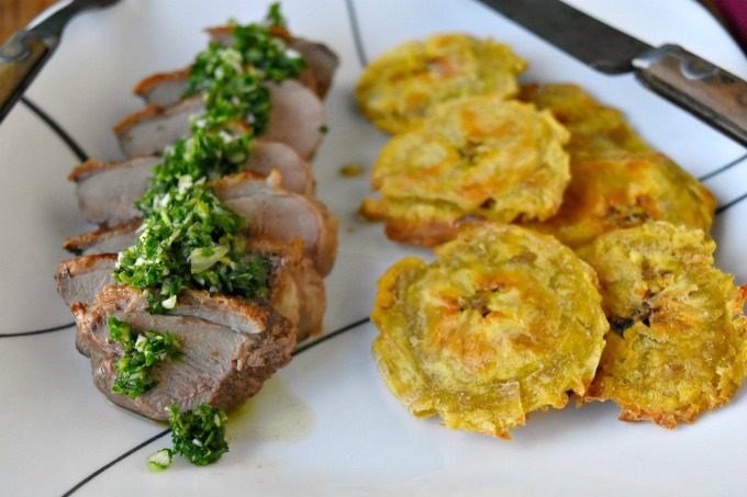 Chimichurri Crispy Duck with Baked Tostones is not your typical duck breast recipe! The skin is crispy, the chimichurri is delicious and the baked tostones round out the Latin American meal. Chimichurri Crispy Duck with Baked Tostones