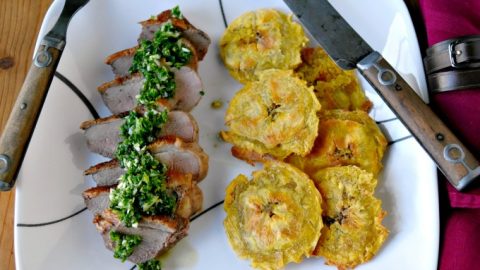 Our Chimichurri Crispy Duck with Baked Tostones will take your taste buds on a journey with its bold flavors and crunchy texture. #ChimichurriCrispyDuck #BakedTostones #LatinoFoodie #FoodieFaves #TastyandUnique