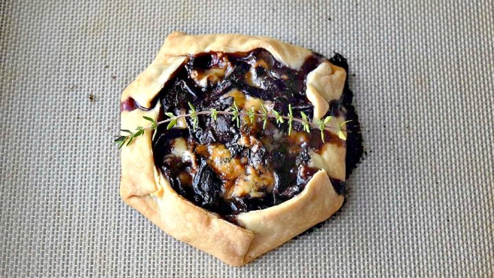 Cherry Stilton Crostata takes on an innovative twist to a classic Italian recipe by combining juicy cherries with creamy Stilton cheese, all wrapped up in a golden-brown flaky pastry. #CrostataCreations #SweetTreats #PastryPerfection #CherryStiltonCombo #BakeFromScratch #SavoryDesserts #FoodieFinds #BakingInspiration #CheeseLoversUnite #stonefruit #cherryrecipe #cherries #crostata #appetizer #fruitandcheese