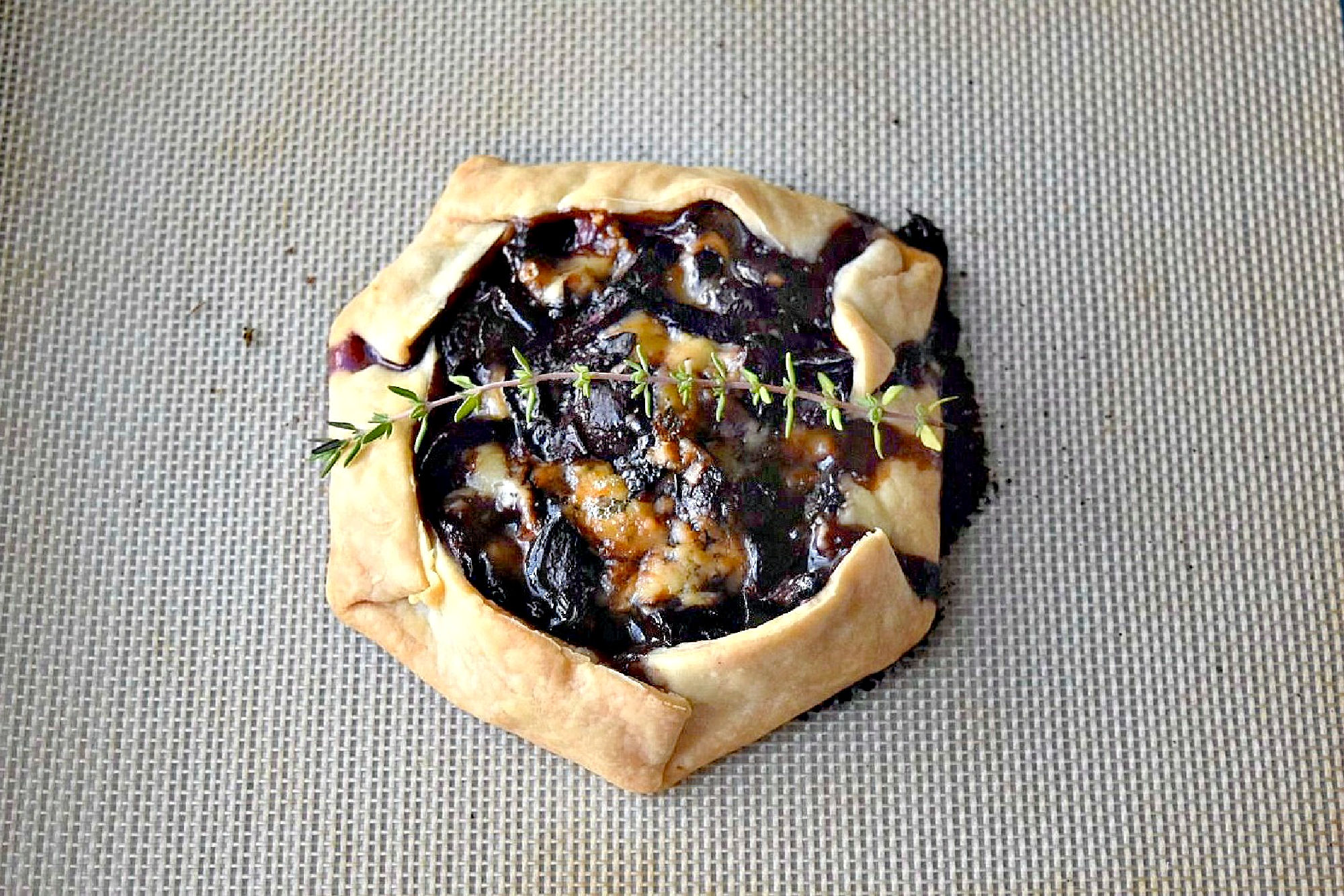 Cherry Stilton Crostata takes on an innovative twist to a classic Italian recipe by combining juicy cherries with creamy Stilton cheese, all wrapped up in a golden-brown flaky pastry. #CrostataCreations #SweetTreats #PastryPerfection #CherryStiltonCombo #BakeFromScratch #SavoryDesserts #FoodieFinds #BakingInspiration #CheeseLoversUnite #stonefruit #cherryrecipe #cherries #crostata #appetizer #fruitandcheese
