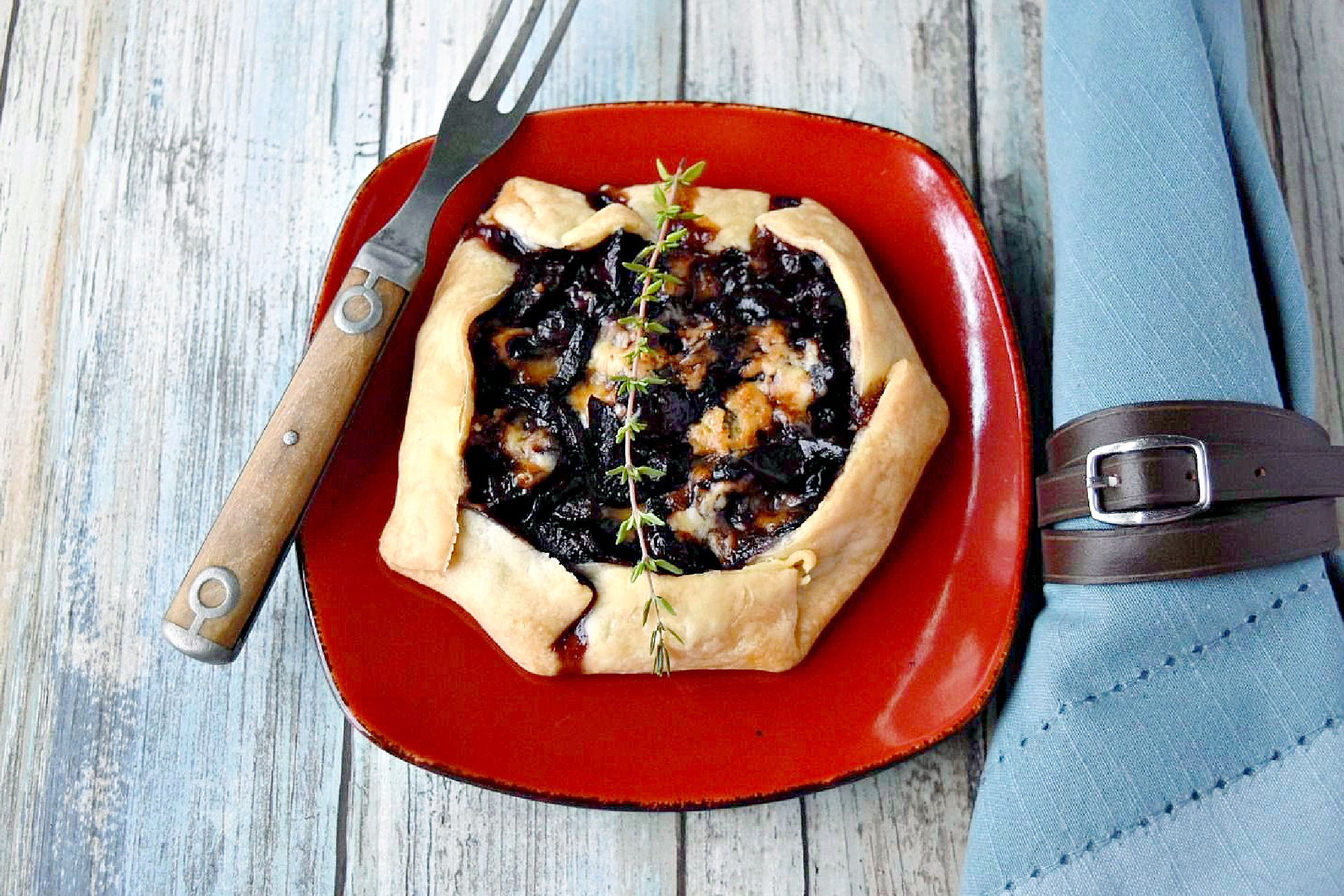 Cherry Stilton Crostata takes on an innovative twist to a classic Italian recipe by combining juicy cherries with creamy Stilton cheese, all wrapped up in a golden-brown flaky pastry. #CrostataCreations #SweetTreats #PastryPerfection #CherryStiltonCombo #BakeFromScratch #SavoryDesserts #FoodieFinds #BakingInspiration #CheeseLoversUnite #stonefruit #cherryrecipe #cherries #crostata #appetizer #fruitandcheese
