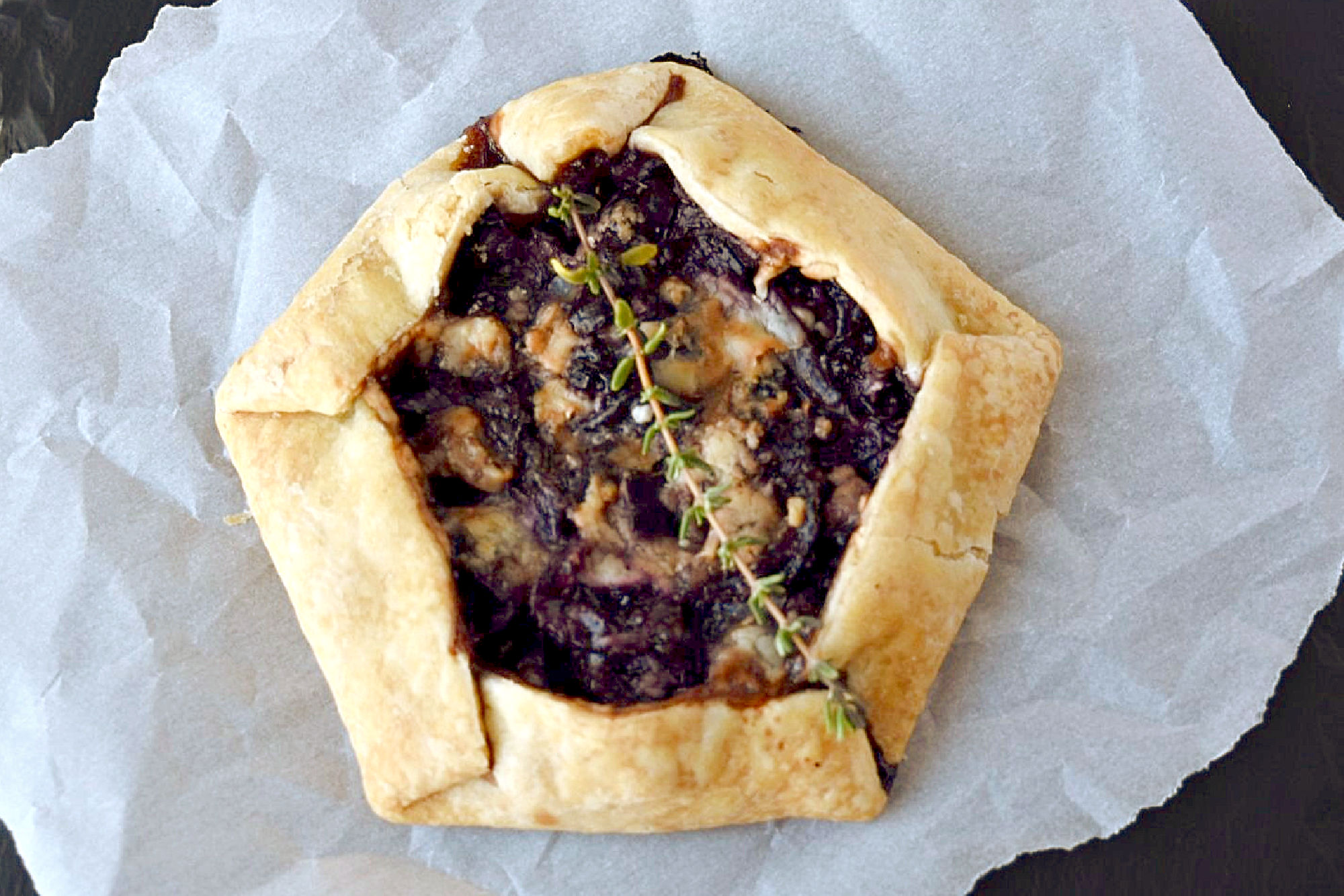 Cherry Stilton Crostata takes on an innovative twist to a classic Italian recipe by combining juicy cherries with creamy Stilton cheese, all wrapped up in a golden-brown flaky pastry. #CrostataCreations #SweetTreats #PastryPerfection #CherryStiltonCombo #BakeFromScratch #SavoryDesserts #FoodieFinds #BakingInspiration #CheeseLoversUnite #stonefruit #cherryrecipe #cherries #crostata #appetizer #fruitandcheese
