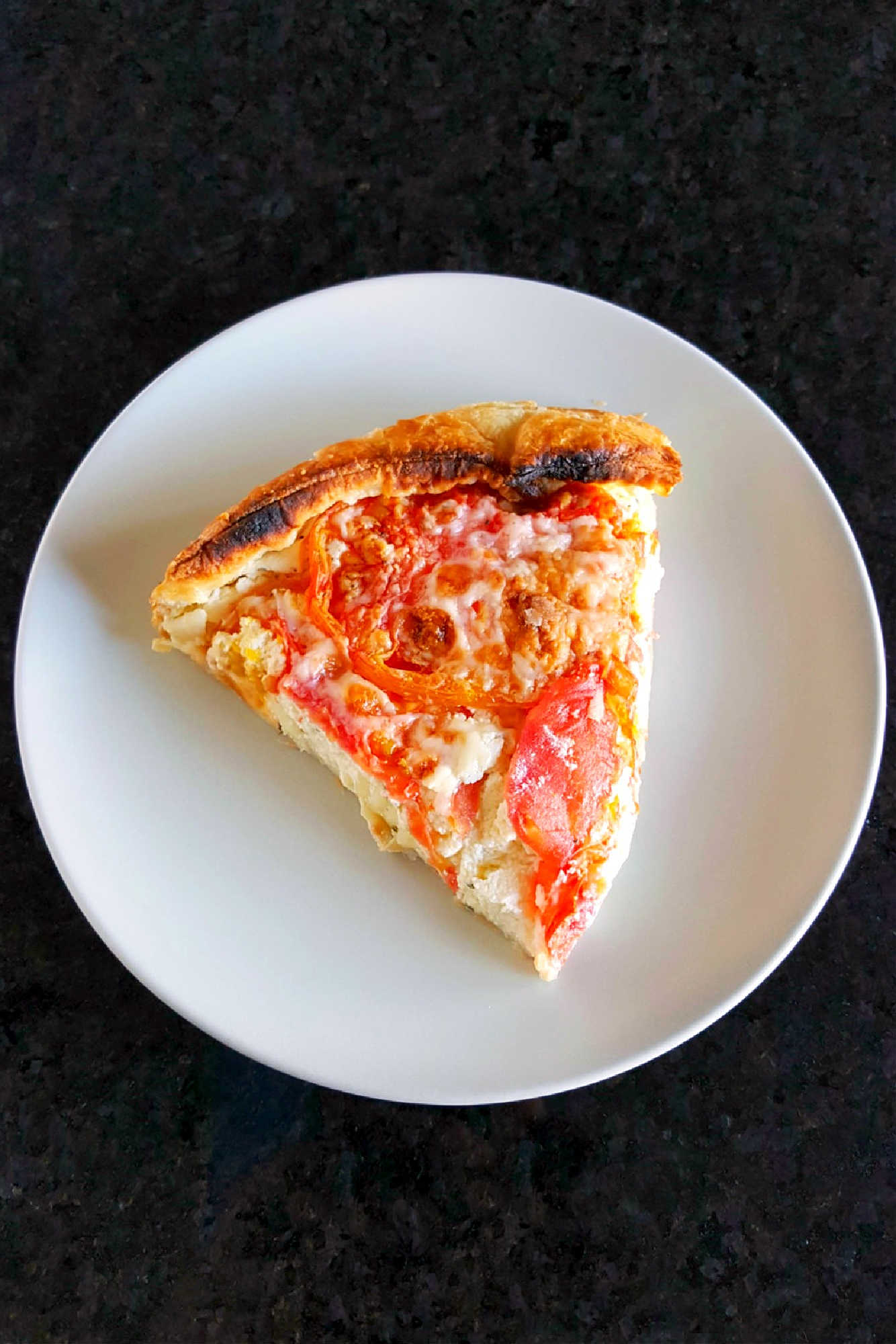 Elevate your brunch game with our Rustic Tomato and Ricotta Tart. 🍅🧀🍳 Perfect for a lazy Sunday morning or impressing guests, this tart is a delicious and Instagram-worthy addition to any meal.  #TomatoTartTuesday #RusticBakes #FarmToFork #SavorySlices #ItalianInspiredEats #TastyTartCreations #RusticRecipeRevival #TomatoRicottaDelight #FarmhouseEats #SavoryTartLove