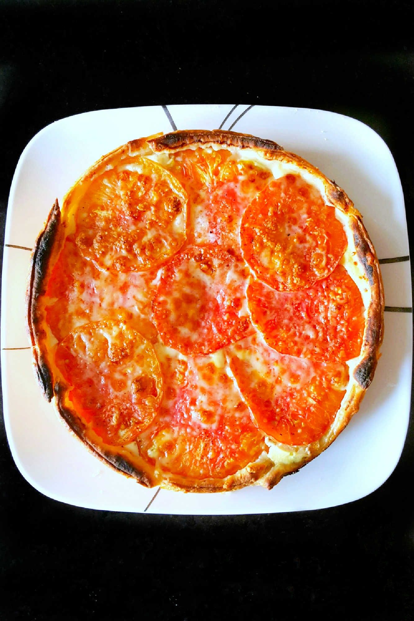 Elevate your brunch game with our Rustic Tomato and Ricotta Tart. 🍅🧀🍳 Perfect for a lazy Sunday morning or impressing guests, this tart is a delicious and Instagram-worthy addition to any meal.  #TomatoTartTuesday #RusticBakes #FarmToFork #SavorySlices #ItalianInspiredEats #TastyTartCreations #RusticRecipeRevival #TomatoRicottaDelight #FarmhouseEats #SavoryTartLove