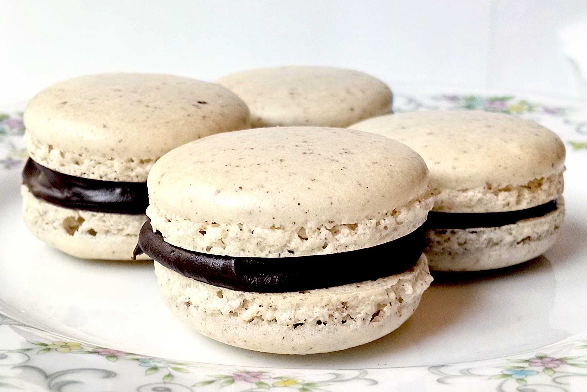 Sink your teeth into the ultimate flavor fusion with Derby Pie Macaron, a unique blend of Kentucky Derby tradition and French pastry perfection. Don't just take our word for it, try it for yourself!  #MacaronMadness #DerbyDelights #BiteSizeBourbon #PiesAndPatisseries #MouthwateringMacarons #DerbyPieMacaron #MacaronObsessed #SweetTreats #KentuckySweets #MacaronLover