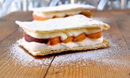 Grilled summer peaches are layered between cream and puff pastry.  Grilled Peach Napoleons with Easy Bavarian Cream sounds fancy, but is easy.  You can prepare everything ahead of time and assemble right before serving for a perfect barbecue dessert.