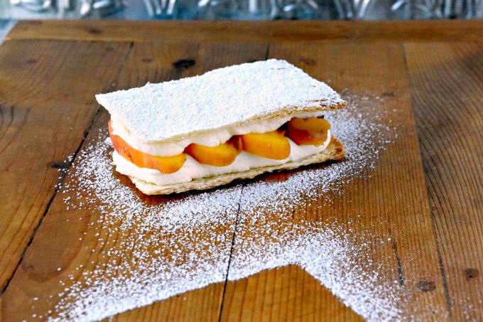 Grilled summer peaches are layered between cream and puff pastry.  Grilled Peach Napoleons with Easy Bavarian Cream sounds fancy, but is easy.  You can prepare everything ahead of time and assemble right before serving for a perfect barbecue dessert.