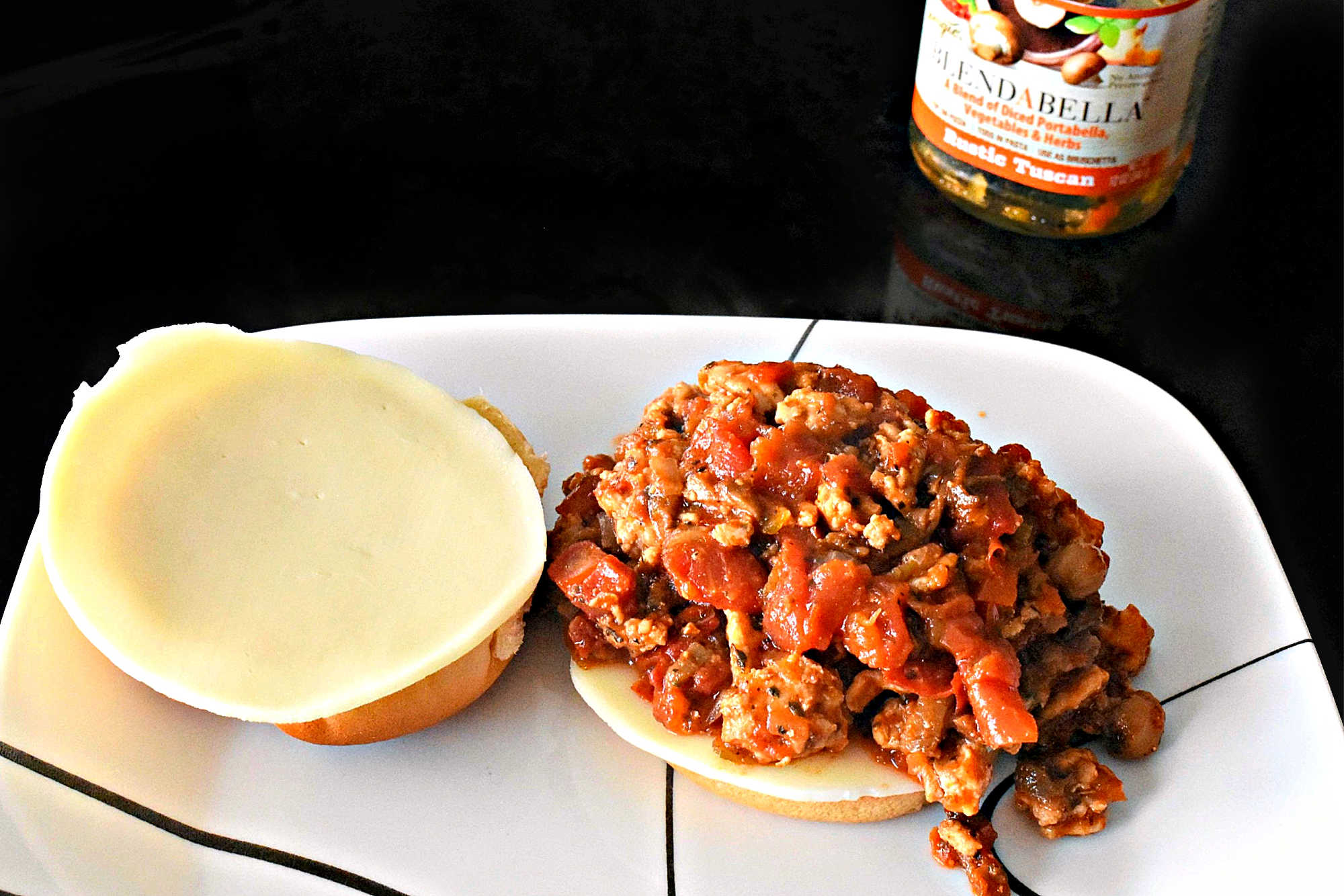 Mix up your traditional Sloppy Joe recipe with a Tuscan twist! These Tuscan Chicken Sloppy Joes are sure to be a hit with the whole family.  #TuscanChickenSloppyJoes #ComfortFoodCravings #ItalianInspiredEats #WeeknightDinnerIdeas #SloppyJoeVariations  #ItalianFlavors #HomemadeDinnerIdeas #EasyWeeknightMeals #FoodieFav