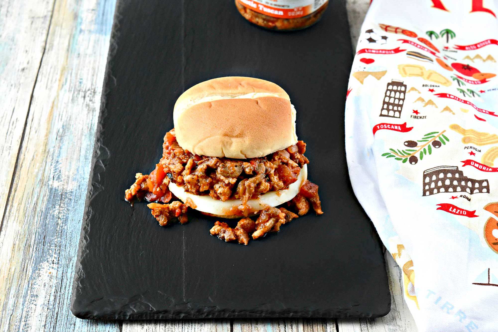 Mix up your traditional Sloppy Joe recipe with a Tuscan twist! These Tuscan Chicken Sloppy Joes are sure to be a hit with the whole family.  #TuscanChickenSloppyJoes #ComfortFoodCravings #ItalianInspiredEats #WeeknightDinnerIdeas #SloppyJoeVariations  #ItalianFlavors #HomemadeDinnerIdeas #EasyWeeknightMeals #FoodieFav