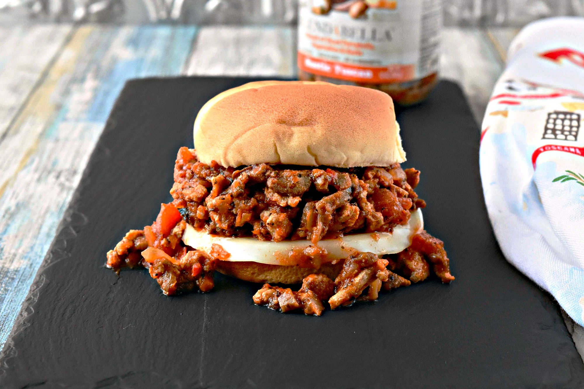Mix up your traditional Sloppy Joe recipe with a Tuscan twist! These Tuscan Chicken Sloppy Joes are sure to be a hit with the whole family.  #TuscanChickenSloppyJoes #ComfortFoodCravings #ItalianInspiredEats #WeeknightDinnerIdeas #SloppyJoeVariations  #ItalianFlavors #HomemadeDinnerIdeas #EasyWeeknightMeals #FoodieFav