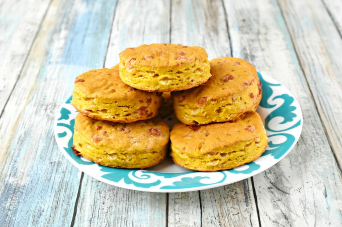 With a hint of pumpkin flavor and packed with cheddar, Pumpkin Cheddar Biscuits are perfect for breakfast or topped with a savory red pepper dip for an afternoon nibble. #PumpkinWeek