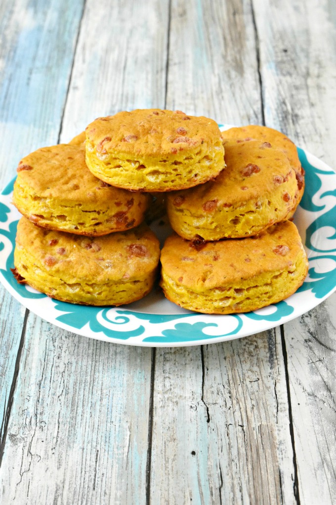 With a hint of pumpkin flavor and packed with cheddar, Pumpkin Cheddar Biscuits are perfect for breakfast or topped with a savory red pepper dip for an afternoon nibble. #PumpkinWeek