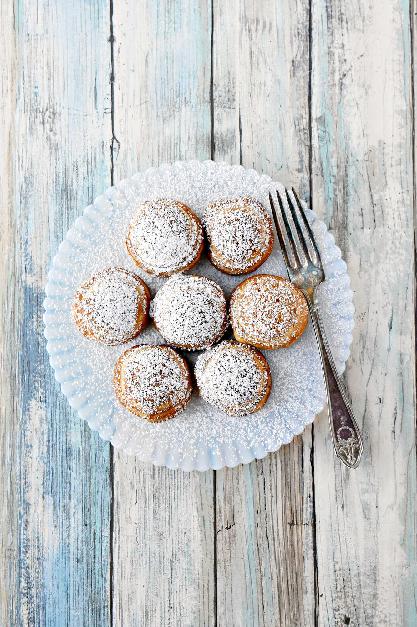 Say goodbye to boring breakfasts and hello to these Pumpkin Cheesecake Ebelskivers! Perfectly fluffy, filled with creamy pumpkin cheesecake, and finished with a dusting of powdered sugar. Your mornings just got a whole lot better.  #PumpkinCheesecakeEbelskiver #FallTreats #PumpkinSpice #CulinaryDelights #FoodieFaves #PumpkinCheesecake #Ebelskivers #FallTreats #FestiveFlavors #HolidayBaking