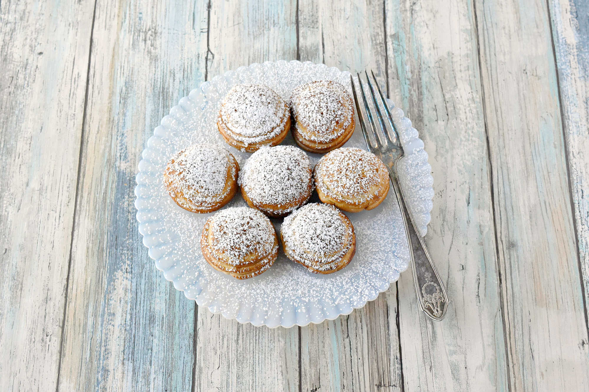 Say goodbye to boring breakfasts and hello to these Pumpkin Cheesecake Ebelskivers! Perfectly fluffy, filled with creamy pumpkin cheesecake, and finished with a dusting of powdered sugar. Your mornings just got a whole lot better.  #PumpkinCheesecakeEbelskiver #FallTreats #PumpkinSpice #CulinaryDelights #FoodieFaves #PumpkinCheesecake #Ebelskivers #FallTreats #FestiveFlavors #HolidayBaking