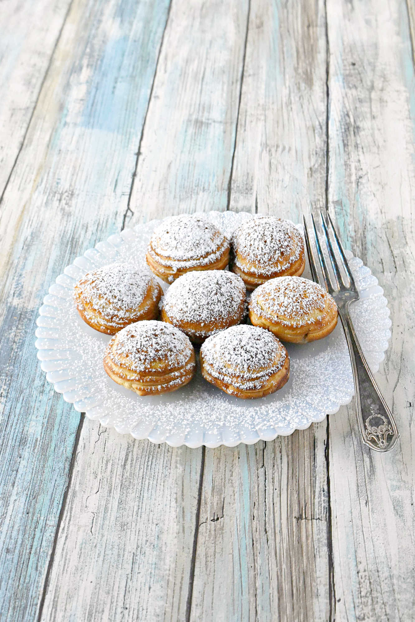 Say goodbye to boring breakfasts and hello to these Pumpkin Cheesecake Ebelskivers! Perfectly fluffy, filled with creamy pumpkin cheesecake, and finished with a dusting of powdered sugar. Your mornings just got a whole lot better.  #PumpkinCheesecakeEbelskiver #FallTreats #PumpkinSpice #CulinaryDelights #FoodieFaves #PumpkinCheesecake #Ebelskivers #FallTreats #FestiveFlavors #HolidayBaking