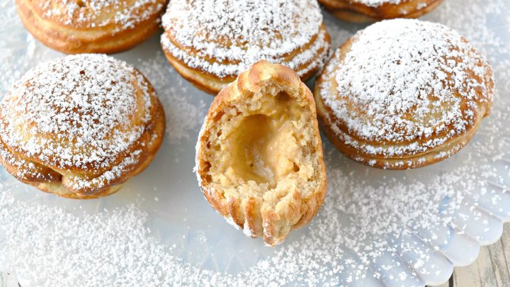 Say goodbye to boring breakfasts and hello to these Pumpkin Cheesecake Ebelskivers! Perfectly fluffy, filled with creamy pumpkin cheesecake, and finished with a dusting of powdered sugar. Your mornings just got a whole lot better. #PumpkinCheesecakeEbelskiver #FallTreats #PumpkinSpice #CulinaryDelights #FoodieFaves #PumpkinCheesecake #Ebelskivers #FallTreats #FestiveFlavors #HolidayBaking