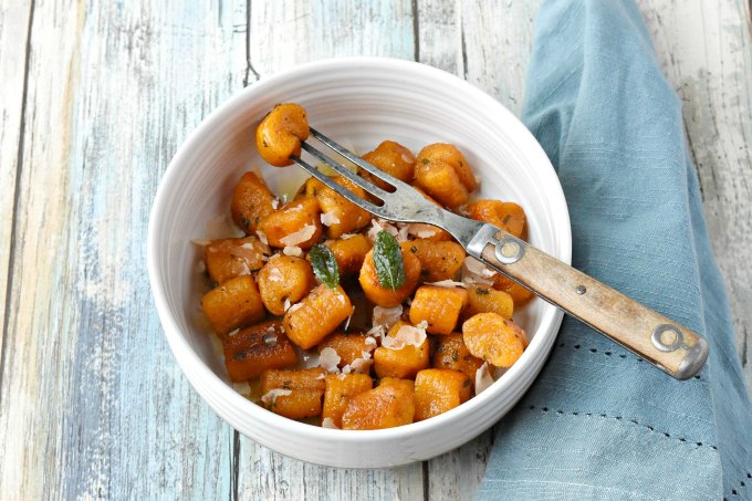 Pillows of pumpkin goodness make Pumpkin Gnocchi with Sage Butter Sauce a truly flavorful pasta dinner.  Add some sausage for a more hearty dinner for your family. #PumpkingWeek