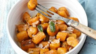 Pillows of pumpkin goodness make Pumpkin Gnocchi with Sage Butter Sauce a truly flavorful pasta dinner.  Add some sausage for a more hearty dinner for your family. #PumpkingWeek