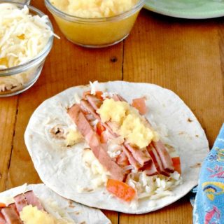 It takes longer to chop the toppings than it does to grill the ham.  That's why you and your family will love these Grilled Ham Hawaiian Tacos.  They're perfect for busy weeknights and fun for the family! #fricks #smokedmeats #itsfrickingood