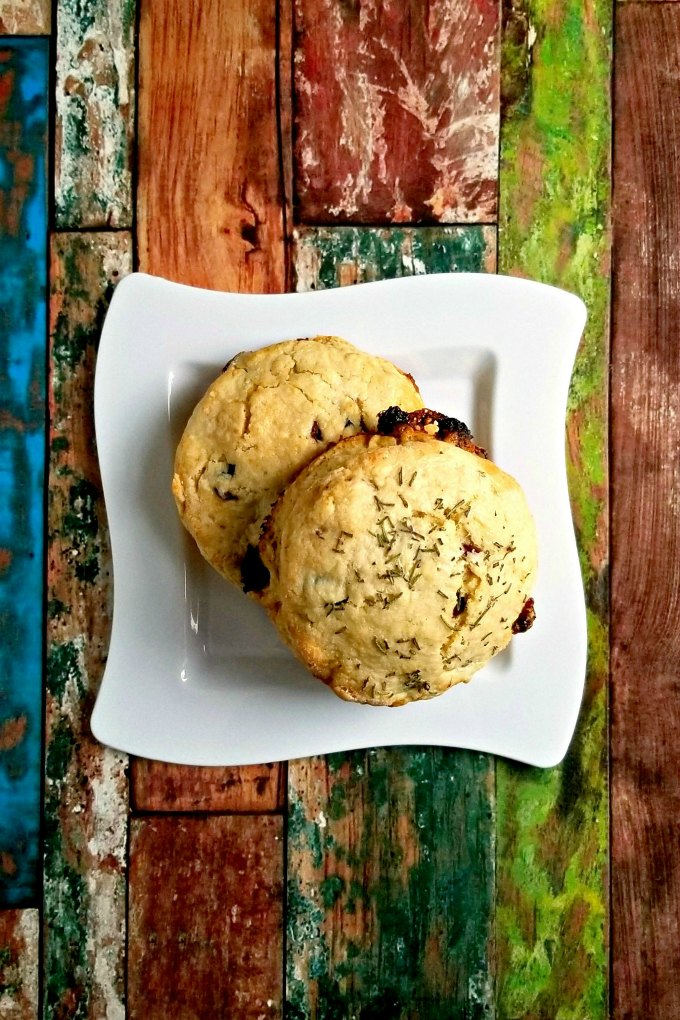 Cranberry White Chocolate Rosemary Scones are packed with flavor, as you imagine. The tart, dried cranberries are offset by the slightly sweet flavor of the white chocolate and touch of sugar in these scones. The unexpected rosemary is not overpowering and truly makes these smell and taste amazing.