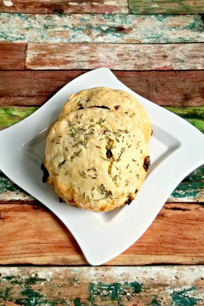 Cranberry White Chocolate Rosemary Scones are packed with flavor, as you imagine.  The tart, dried cranberries are offset by the slightly sweet flavor of the white chocolate and touch of sugar in these scones.  The unexpected rosemary is not overpowering and truly makes these smell and taste amazing.
