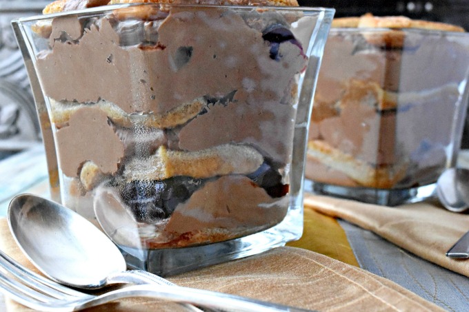 Rich semi-sweet chocolate is melted and whipped into mascarpone cheese and whipping cream with a dash of LorAnn Oils & Flavors cherry emulsion.  Black Forest Tiramisu Parfait is decadent, delicious, and super easy to make.  Which is good because you're family will ask for them time and time again.
