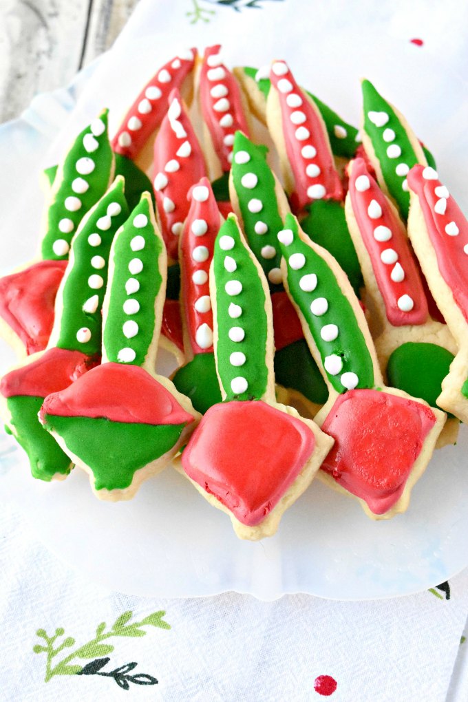 A simple sugar cookie recipe turns into a fun and festive cookie with this nostalgic cookie cutter.  Bubble Light Sugar Cookies boasts delicious holiday flavor with a little cookie butter flavor added to the dough.