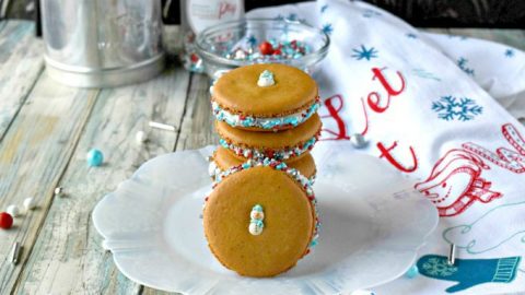 Perfectly delicious and packed with amazing gingerbread flavor, these Gingerbread Macaron have the best cream cheese buttercream filling.  The combination of flavors and cute Sprinkle Pop decorations make these irresistible! 