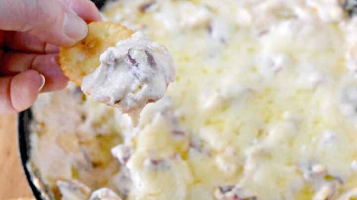 Warm, gooey Reuben flavors meet fresh sprouts for a dip that's perfect for any gathering. Scoop up something new and let every bite surprise you. Learn more in our bio. #reubensandwich #reubendip #cheesydip #diprecipe #ReubenDipDelight #MeatLoversFavorite #GourmetSnacks #HotandSavory #FoodieFavorites