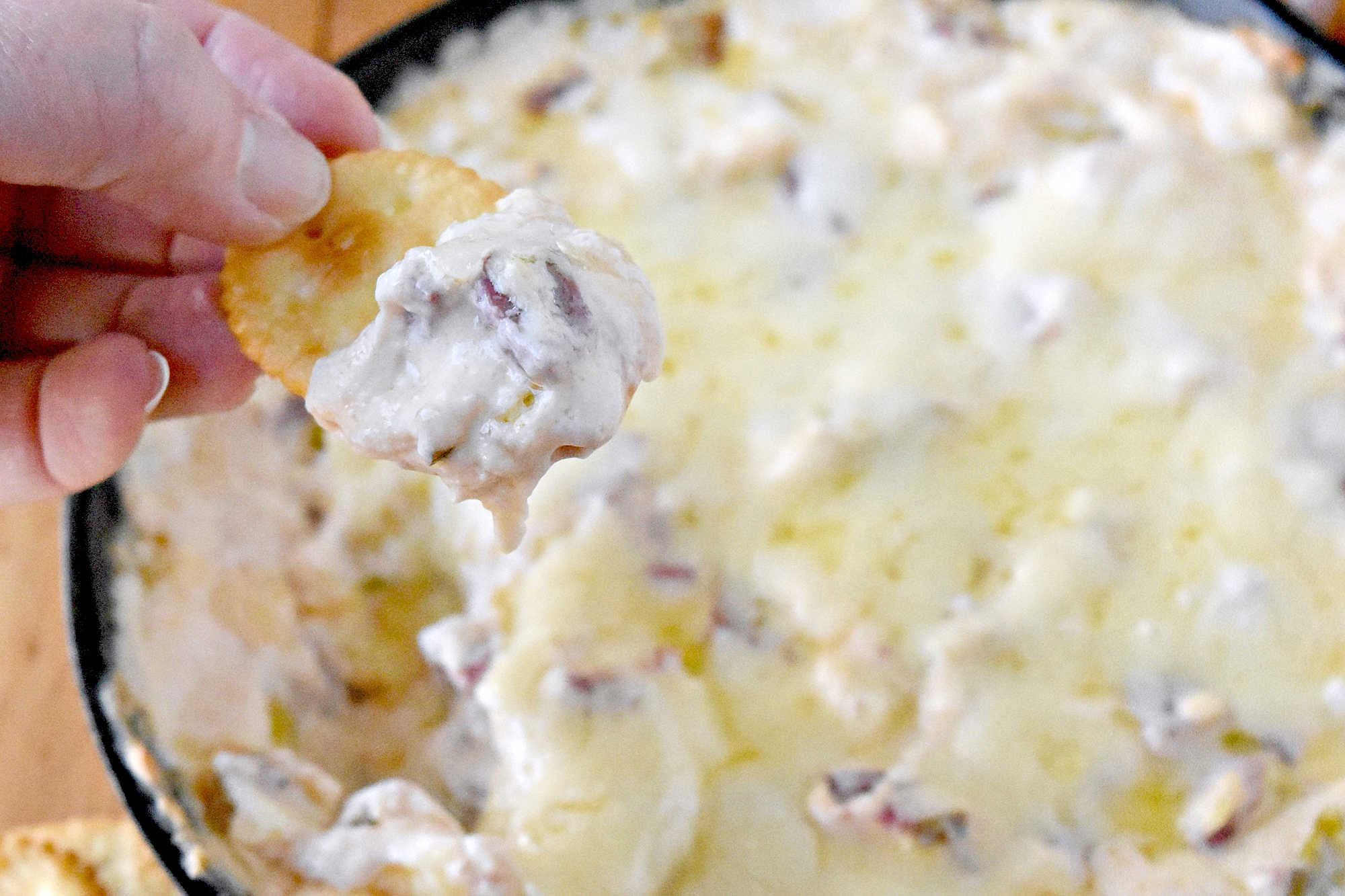 Warm, gooey Reuben flavors meet fresh sprouts for a dip that's perfect for any gathering. Scoop up something new and let every bite surprise you. Learn more in our bio. #reubensandwich #reubendip #cheesydip #diprecipe #ReubenDipDelight #MeatLoversFavorite #GourmetSnacks #HotandSavory #FoodieFavorites