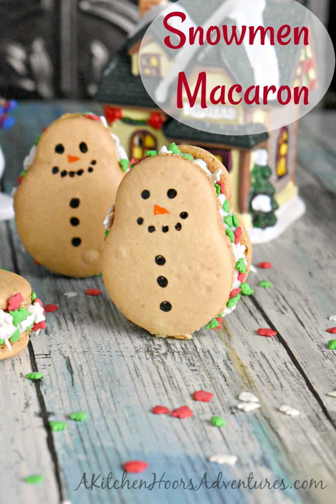 Coconut in shells and almond extract in the buttercream make these Snowmen Macaron taste like an almond joy!  It wouldn't be a blogging event if I didn't make my favorite cookie.  