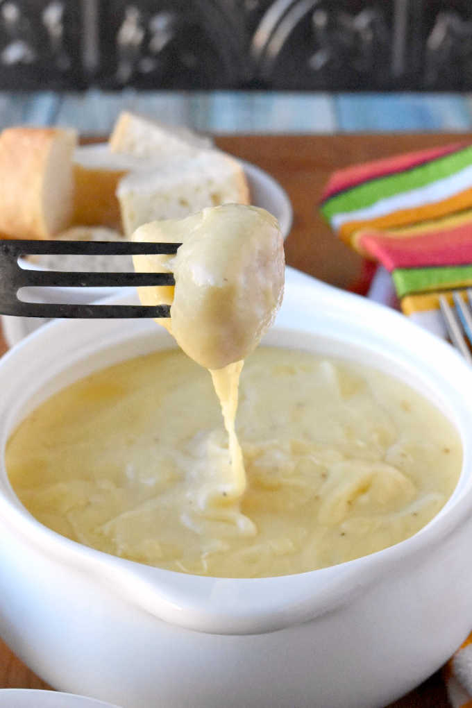 Fondue is a classic recipe for Valentine's Day. It's perfect for dipping, eating, chatting, and spending time with your special someone. This Smoked Gouda Fondue boasts a deliciously smoky flavor you will love.