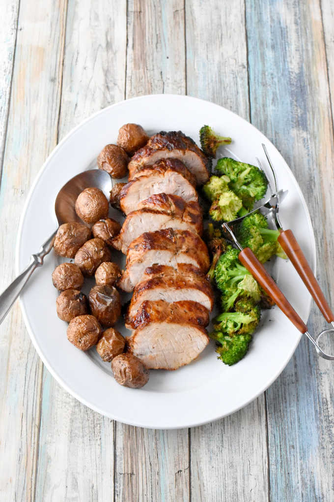 A simple meal of rotisserie roasted pork loin, potatoes, and broccoli all made in the air fryer. Garlic & Herb Rotisserie Pork Dinner is really flavorful and real fast to make. Made with Smithfield® marinated fresh pork, it’s our new family favorite!
