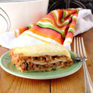 Delicious taco meat is combined with tomatoes and cheese soup before being sandwiched between layers of flour tortillas. Taco Lasagna is the best of both worlds combining tacos and lasagna into one family friendly dish!