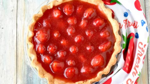 Simply sweet and simply delicious, Strawberry Pie is easy to make and worth every bite.  The fresh strawberries swimming in fresh strawberry jelly are the epitome of spring! #SpringSweetsWeek