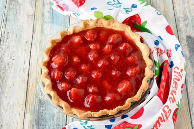 Simply sweet and simply delicious, Fresh Strawberry Pie is easy to make and worth every bite.  The fresh strawberries swimming in fresh strawberry jelly are the epitome of spring! #SpringSweetsWeek
