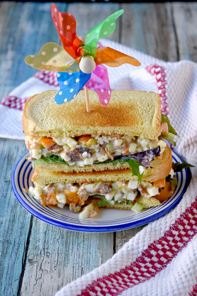 Kick up your egg salad!  BLT Egg Salad Sandwich has bacon and tomato added to the egg salad for added delicious flavor.