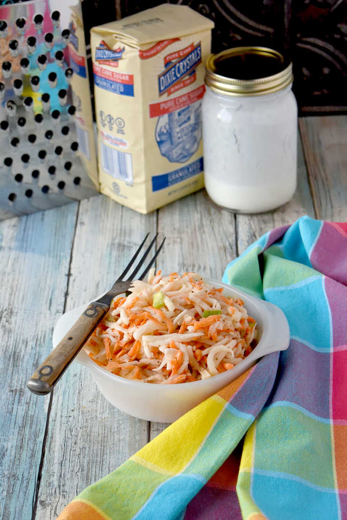Swap out the cabbage in your slaw and try fresh and delicious kohlrabi.  Carrot Kohlrabi Coleslaw is super crunchy, has great flavor, and is the perfect twist on a southern classic picnic dish.